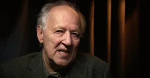 Lendário cineasta Werner Herzog declara que filmes feitos por IA possuem história, mas carecem de alma.